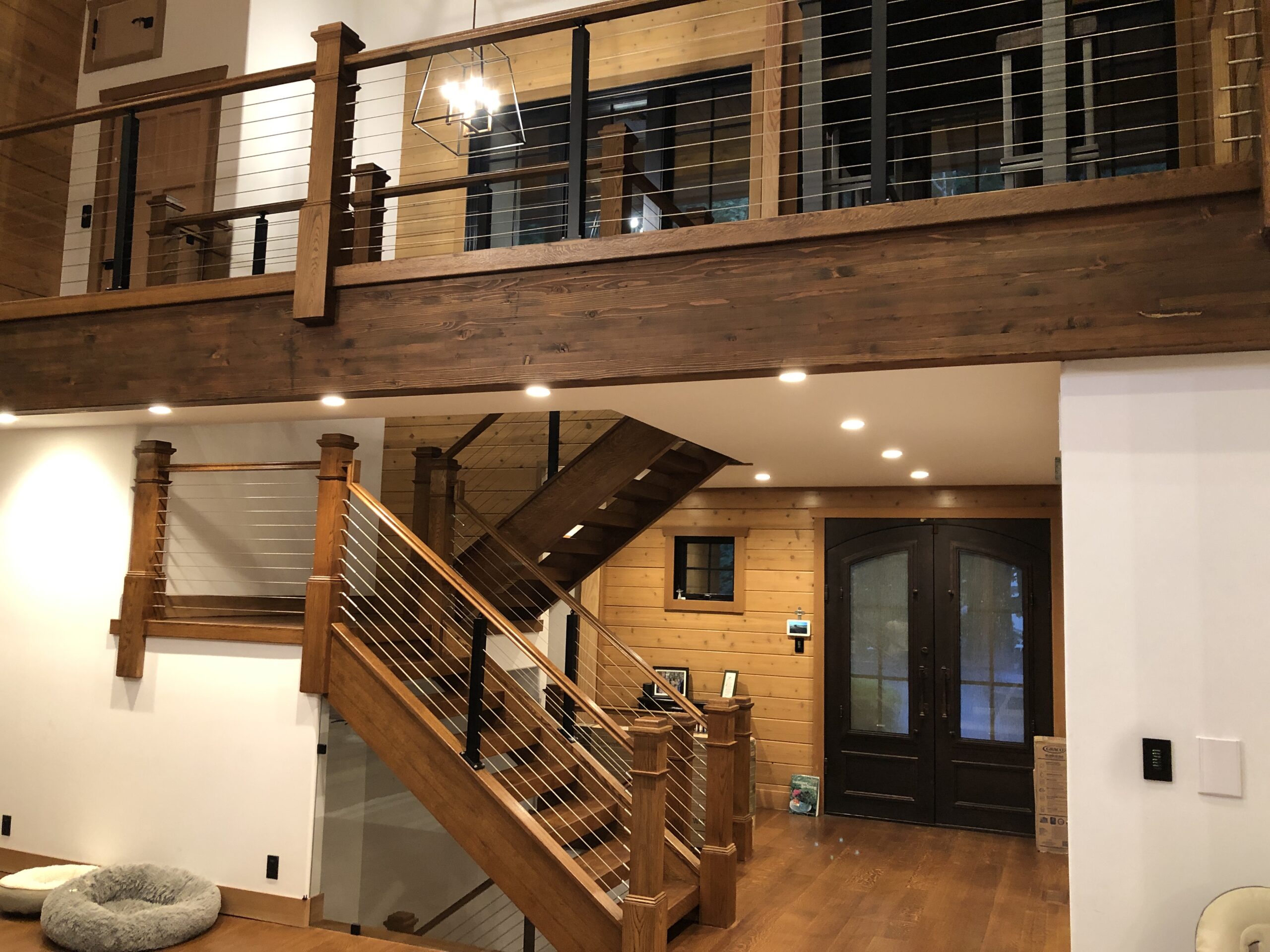 Foyer entrance with stair case to the second, first, and ground floor